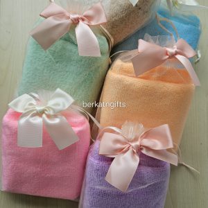 Towel in organza pouch with bow